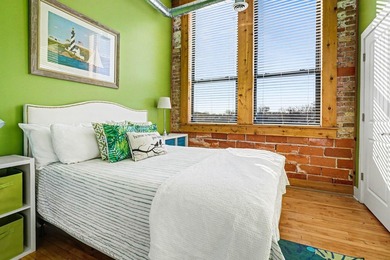 Loft Style Condo in the highly sought-after Central Lofts! This