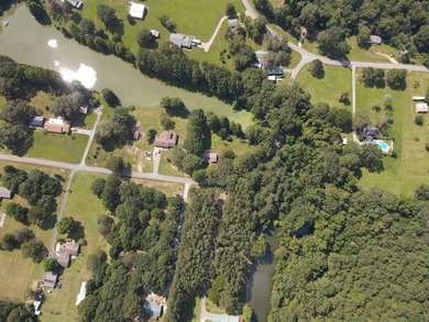 WELCOME TO 24 DEAN MATTHEWS ROAD, A CHARMING WATERFRONT RETREAT - photo 2