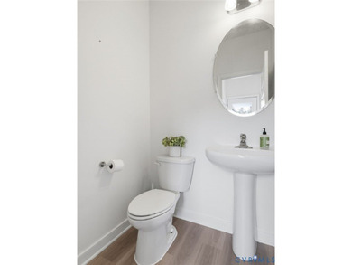 WELCOME HOME to this beautifully appointed end-unit townhome in - photo 11