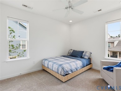 WELCOME HOME to this beautifully appointed end-unit townhome in - photo 18