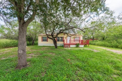 MAIN HOME IS A DOUBLE WIDE MANUFACTURED HOME WITH 3 BEDROOMS AND - Lake Home For Sale in Sandia, Texas