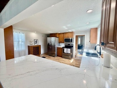 Completely remodeled and ready to enjoy, this beautifully - photo 9