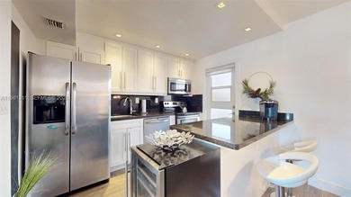 Enjoy oceanfront living in this beautifully maintained 2-bedroom