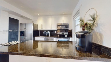 Enjoy oceanfront living in this beautifully maintained 2-bedroom