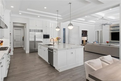 Welcome to this extraordinary waterfront estate in the gated - photo 30