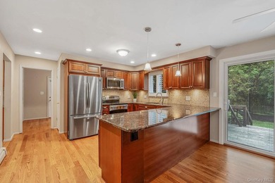 Spacious Contemporary Colonial situated on nearly an acre lot in - photo 11