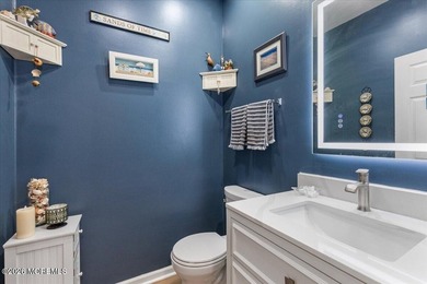 Experience elevated coastal living in this exceptional custom - photo 19