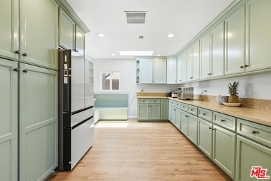 Beautifully updated coastal residence featuring 4 bedrooms, 2 - photo 9