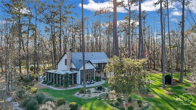 This rare 2-bedroom, 2-bath Lowcountry cottage is nestled on - photo 40