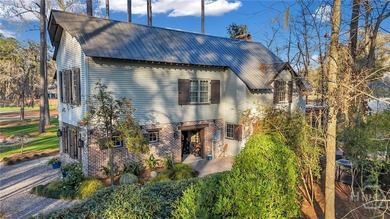 This rare 2-bedroom, 2-bath Lowcountry cottage is nestled on - photo 46