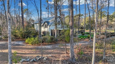 This rare 2-bedroom, 2-bath Lowcountry cottage is nestled on - photo 47