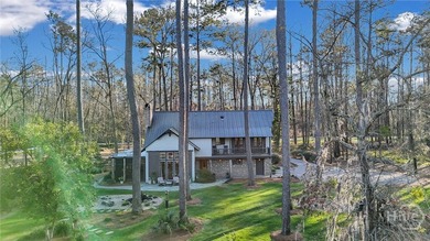 This rare 2-bedroom, 2-bath Lowcountry cottage is nestled on - photo 48