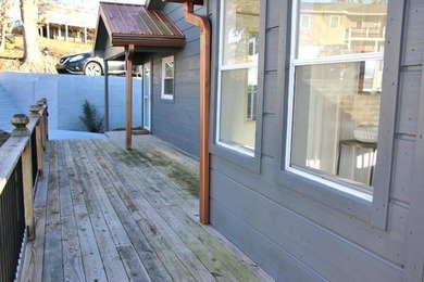 AMAZING PANORAMIC LAKE VIEWS FROM THE NEW WRAPAROUND DECK & HUGE