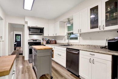 SPACIOUS. CHARMING. RECREATIONAL. This beautiful farmhouse-style - photo 11