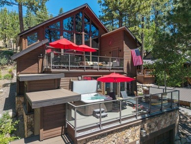 Perched just steps from the shoreline, this extensively - photo 2