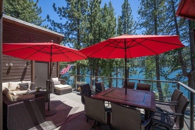 Perched just steps from the shoreline, this extensively - photo 4