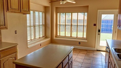 Welcome to this spacious 6-bedroom, 3.5-bath home in one of The - photo 11