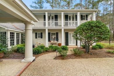 This charming Southern residence is gracefully set behind a - photo 12