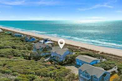 This oceanfront 4-bedroom plus flex, 4.5-bath, home sits on a - photo 2