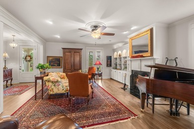 This charming Southern residence is gracefully set behind a - photo 15