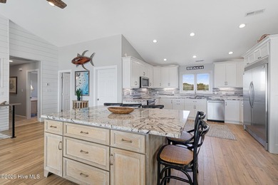 This oceanfront 4-bedroom plus flex, 4.5-bath, home sits on a - photo 5