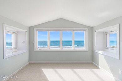 This oceanfront 4-bedroom plus flex, 4.5-bath, home sits on a - photo 7