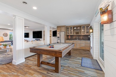 This oceanfront 4-bedroom plus flex, 4.5-bath, home sits on a - photo 9