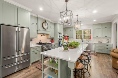 This charming Southern residence is gracefully set behind a - photo 21