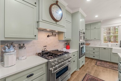 This charming Southern residence is gracefully set behind a - photo 22