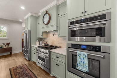 This charming Southern residence is gracefully set behind a - photo 23
