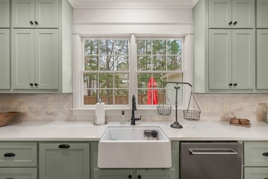 This charming Southern residence is gracefully set behind a - photo 24