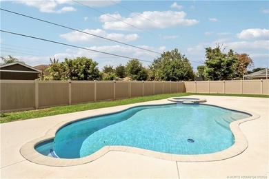 WOW!! Gorgeous custom pool home featuring 4 spacious bedrooms, 3 - photo 24