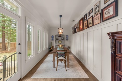 This charming Southern residence is gracefully set behind a - photo 30