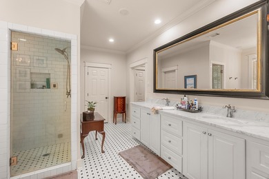 This charming Southern residence is gracefully set behind a - photo 35