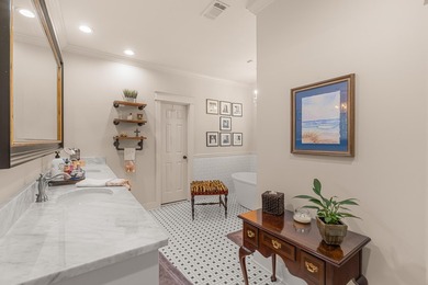 This charming Southern residence is gracefully set behind a - photo 36