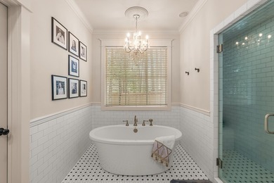 This charming Southern residence is gracefully set behind a - photo 37