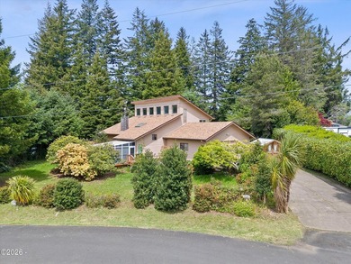 CHARMING COASTAL HOME! This 2,320 square foot home is located on - photo 1