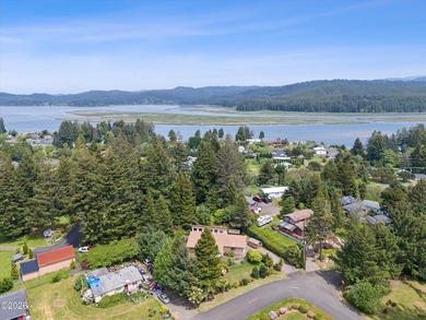 CHARMING COASTAL HOME! This 2,320 square foot home is located on - photo 2