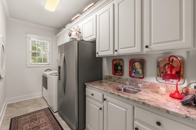 This charming Southern residence is gracefully set behind a - photo 43