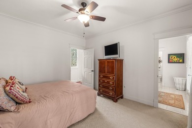 This charming Southern residence is gracefully set behind a - photo 46