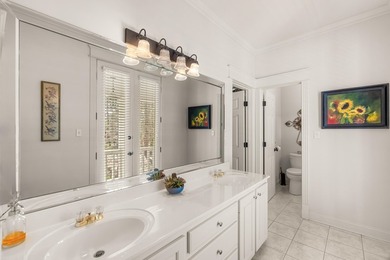 This charming Southern residence is gracefully set behind a - photo 47