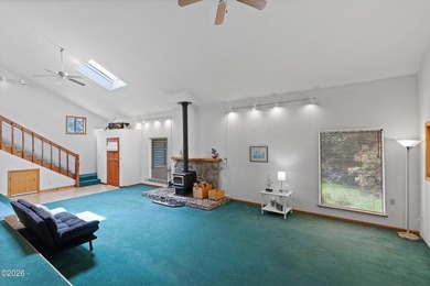 CHARMING COASTAL HOME! This 2,320 square foot home is located on - photo 9