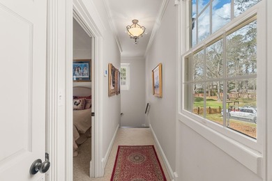 This charming Southern residence is gracefully set behind a - photo 50