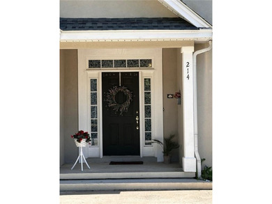 Standing in the entry foyer of this beautiful home, one is - photo 4