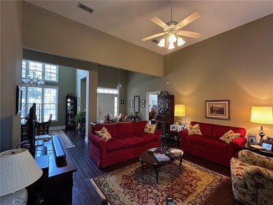 Standing in the entry foyer of this beautiful home, one is - photo 9