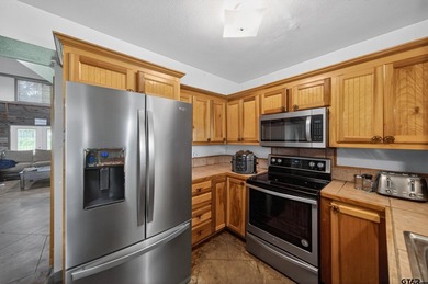 Set on 5.496 scenic acres in Alba, this versatile property is - photo 25