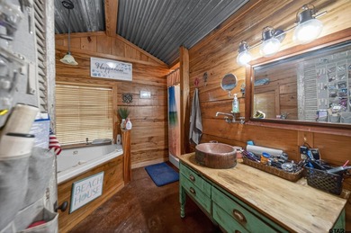Set on 5.496 scenic acres in Alba, this versatile property is - photo 30