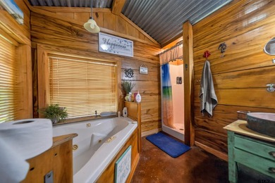 Set on 5.496 scenic acres in Alba, this versatile property is - photo 31