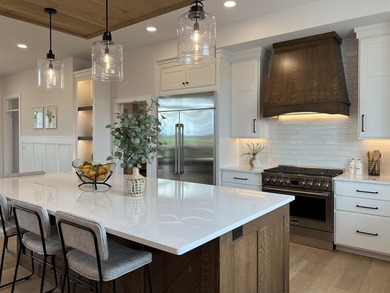 Step into this sunlight-filled home with Amish made built-ins - photo 12