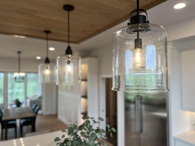 Step into this sunlight-filled home with Amish made built-ins - photo 13
